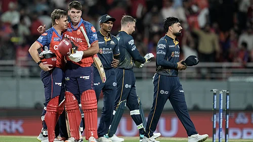 (AP Photo/Ashwini Bhatia) : Punjab Kings Cooper Connolly, left, and Xavier Bartlett celebrate after winning the Indian Premier League cricket match against Gujarat Titans in New Chandigarh, India, Tuesday, March 31, 2026
