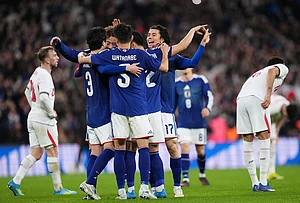 | Photo: AP/Kirsty Wigglesworth : Japan players celebrate after winning the International friendly soccer match between England and Japan in London.