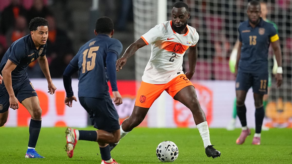 | Photo: AP/Peter Dejong : Ecuador's Pedro Vite guards Netherlands' Lutsharel Geertruida during a friendly soccer match between the Netherlands and Ecuador in Eindhoven, Netherlands, Tuesday, March 31, 2026. 
