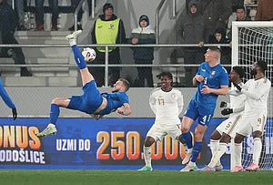 | Photo: AP/Darko Vojinovic : Serbia's Strahinja Pavlovic, left, scores his side's first goal during the international friendly soccer match between Serbia and Saudi Arabia in Backa Topola, Serbia.