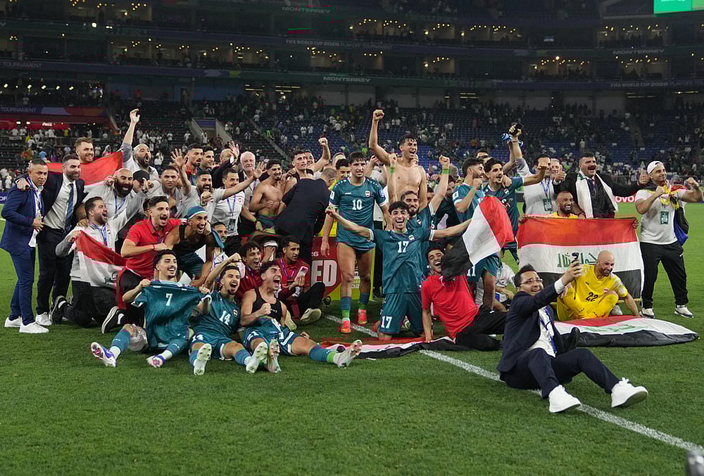 | Photo: AP/Fernando Llano : Iraqs players celebrate after the World Cup playoff final soccer match between Iraq and Bolivia in Monterrey, Mexico.
