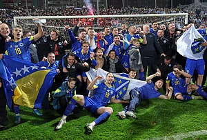 | Photo: AP/Armin Durgut : Bosnia players celebrate after winning a penalty shootout at the end of the World Cup qualifying playoff final soccer match between Bosnia and Italy in Zenica, Bosnia.