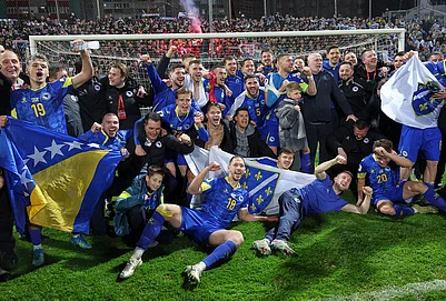 | Photo: AP/Armin Durgut : Bosnia players celebrate after winning a penalty shootout at the end of the World Cup qualifying playoff final soccer match between Bosnia and Italy in Zenica, Bosnia.