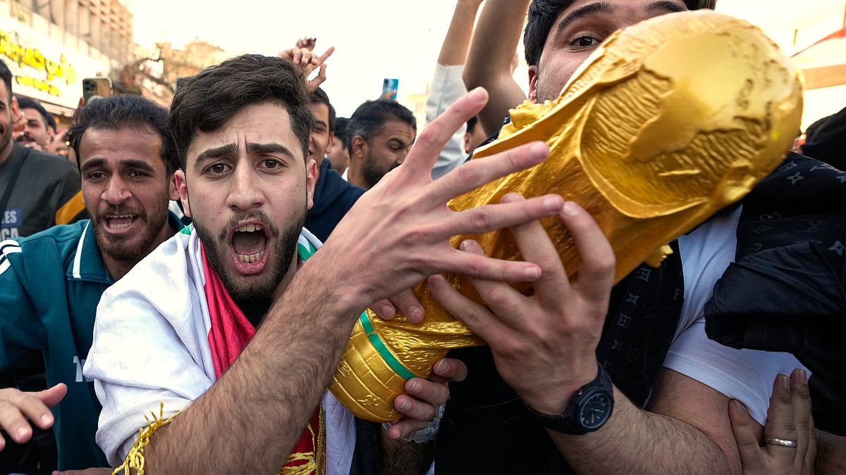 | Photo: AP/Hadi Mizban : Soccer fans take to the street in Baghdad, Iraq, after the Iraq soccer team won over Bolivia in a World Cup 2026 playoff final in central Baghdad, Iraq, Wednesday, April 1, 2026.