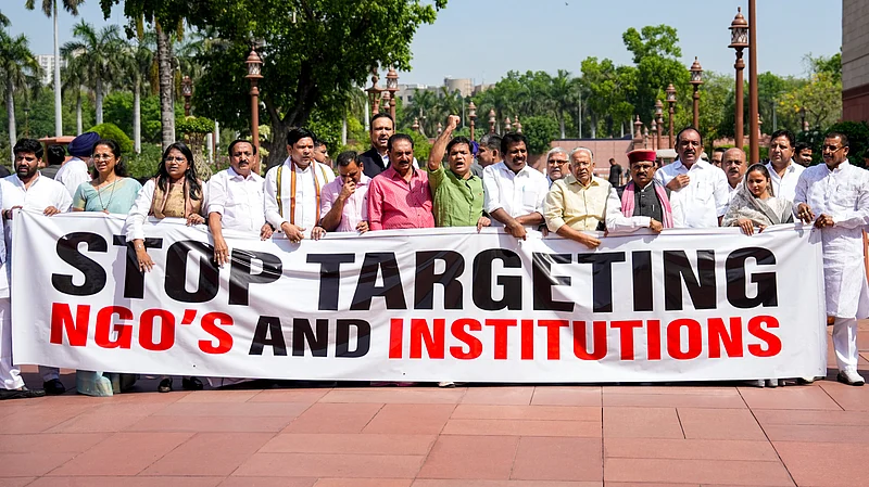 Source: PTI : Opposition MPs Hibi Eden, Prashant Padole, Dean Kuriakose, Supriya Sule, and others, stage a protest during the second part of the Budget session of Parliament, in New Delhi, Wednesday, April 1, 2026.
