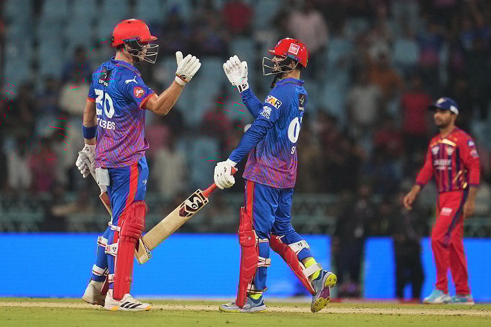 | Photo: AP/Manish Swarup : Delhi Capitals Tristan Stubbs, left, and batting partner Sameer Rizvi celebrate their win in the Indian Premier League cricket match against Lucknow Super Giants in Lucknow, India.