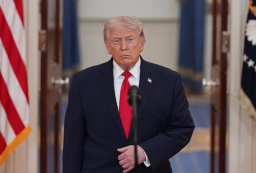 | Photo: AP/Alex Brandon, Pool : US President Donald Trump arrives to speak about the Iran war from the Cross Hall of the White House in Washington.