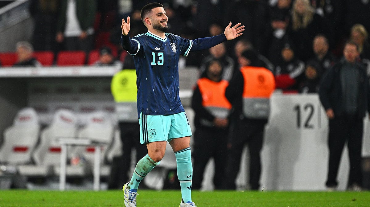 | Photo: dpa/Tom Weller via AP : Germany's Deniz Undav celebrates after scoring a goal during an international friendly soccer match between Germany and Ghana, in Stuttgart, Germany, Monday, March 30, 2026. 