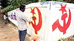 | Photo: PTI| Representative Image : Artists paint the LDF symbol on a wall as part of preparations for the upcoming Kerala local body elections, in Thiruvananthapuram.