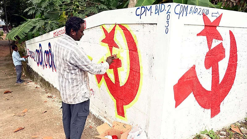 | Photo: PTI| Representative Image : Artists paint the LDF symbol on a wall as part of preparations for the upcoming Kerala local body elections, in Thiruvananthapuram.