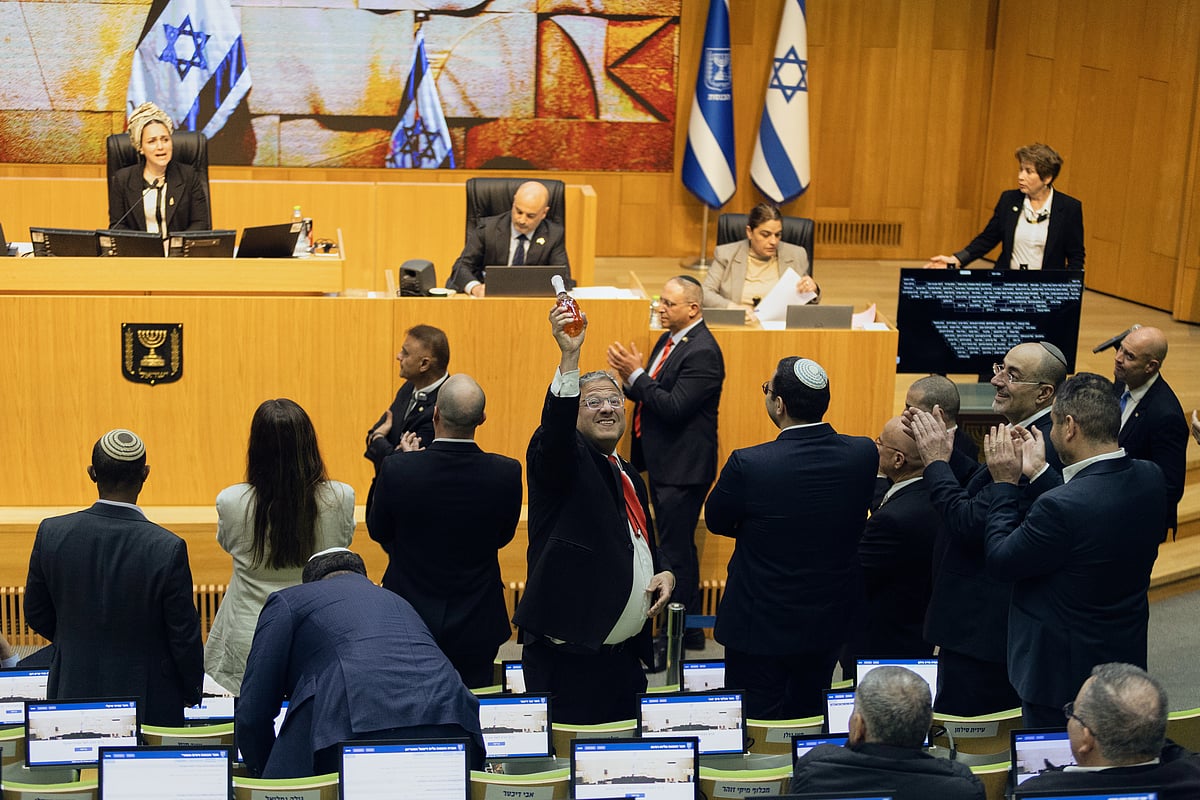 AP Photo/Itay Cohen : Israels Minister of National Security, Itamar Ben-Gvir, center, and lawmakers celebrate after Israels parliament passed a law approving the death penalty for Palestinians convicted of murdering Israelis, at the Knesset in Jerusalem Monday, March 30, 2026.