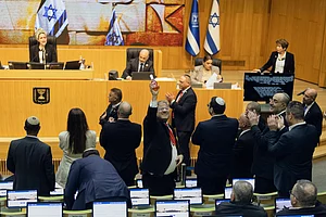 AP Photo/Itay Cohen : Israels Minister of National Security, Itamar Ben-Gvir, center, and lawmakers celebrate after Israels parliament passed a law approving the death penalty for Palestinians convicted of murdering Israelis, at the Knesset in Jerusalem Monday, March 30, 2026.