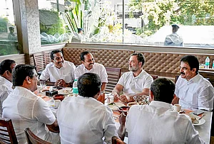 | Photo: @INCIndia/X via PTI : Leader of Opposition in Lok Sabha Rahul Gandhi with Congress MP KC Venugopal, and other party leaders, during a meeting ahead of the Kerala Assembly elections, in Kerala.