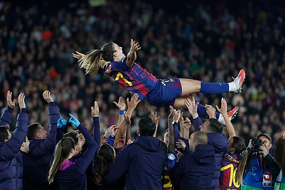 | Photo: AP/Joan Monfort : Barcelonas Alexia Putellas is lifted in the air by her teammates to celebrate her 500th match with Barcelona at the end of a Champions League quarterfinal soccer match between Barcelona and Real Madrid, in Barcelona, Spain.