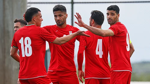 (AP Photo/Riza Ozel) : Irans Mehdi Taremi, right, celebrates with teammates after scoring their sides second goal during a friendly soccer match between Iran and Costa Rica, in Antalya, southern Turkey, Tuesday, March 31, 2026.