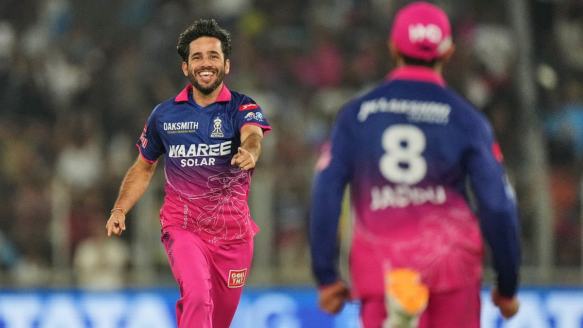 Ravi Bishnoi celebrates his wicket with Ravindra Jadeja during Gujarat Titans vs Rajasthan Royals IPL 2026 match. 