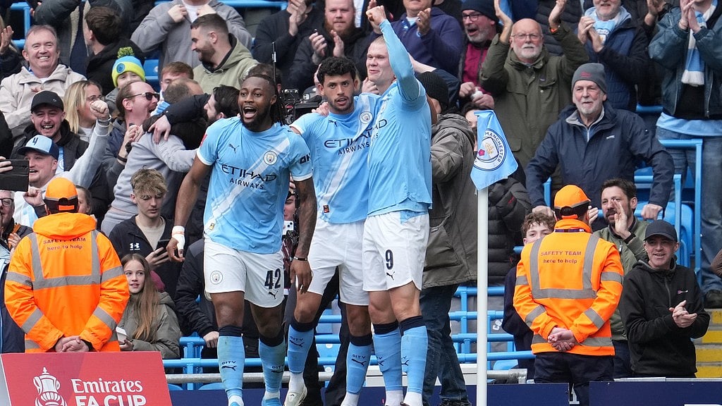 AP : Manchester City players celebrate after a goal during the FA Cup quarter-final against Liverpool in Manchester.