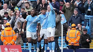 AP : Manchester City players celebrate after a goal during the FA Cup quarter-final against Liverpool in Manchester.