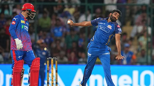 (AP Photo/Manish Swarup) : Mumbai Indians Jasprit Bumrah bowls a delivery during the Indian Premier League cricket match between Delhi Capitals and Mumbai Indians in New Delhi, India, Saturday, April. 4, 2026.