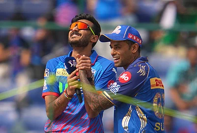 | Photo: AP/Manish SwarupManish Swarup : Mumbai Indians stand on captain Suryakumar Yadav, right, playfully holds the hand of Delhi Capitals captain Axar Patel during the coin toss in the Indian Premier League cricket match between Delhi Capitals and Mumbai Indians in New Delhi.