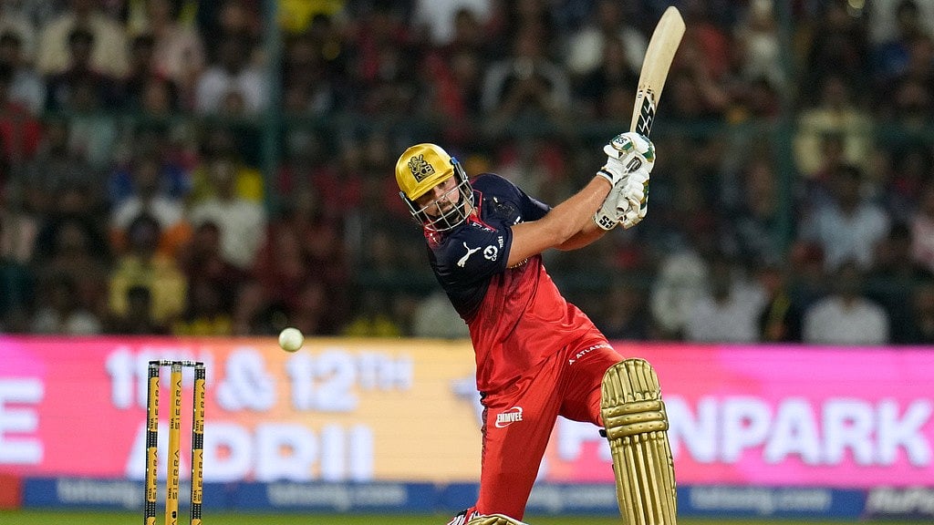 AP : Royal Challengers Bengalurus Tim David plays a shot during the Indian Premier League match against Chennai Super Kings in Bengaluru.