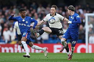 | Photo: AP/Ian Walton : Port Vale's Kyle John, centre, in action against Chelsea's Estevao, left, and Chelsea's Alejandro Garnacho during the English FA Cup quarterfinal soccer match between Chelsea and Port Vale in London, England.