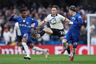 | Photo: AP/Ian Walton : Port Vales Kyle John, centre, in action against Chelseas Estevao, left, and Chelseas Alejandro Garnacho during the English FA Cup quarterfinal soccer match between Chelsea and Port Vale in London, England.