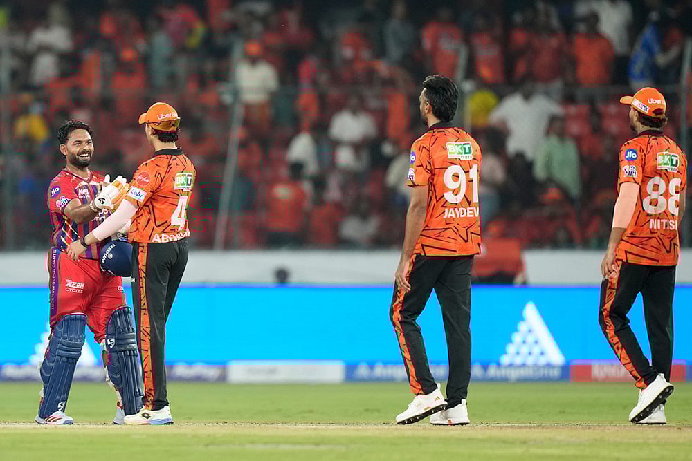 Photo: AP/Mahesh Kumar A. : Lucknow Super Giants captain Rishabh Pant, left, shakes hands with Sunrisers Hyderabads players after winning the Indian Premier League cricket match between Sunrisers Hyderabad and Lucknow Super Giants in Hyderabad, India.