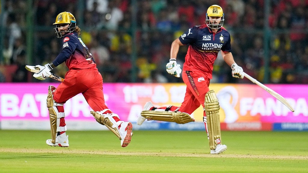 AP : Royal Challengers Bengalurus captain Rajat Patidar, left, and batting partner Tim David run between the wickets during their Indian Premier League match against Chennai Super Kings in Bengaluru.