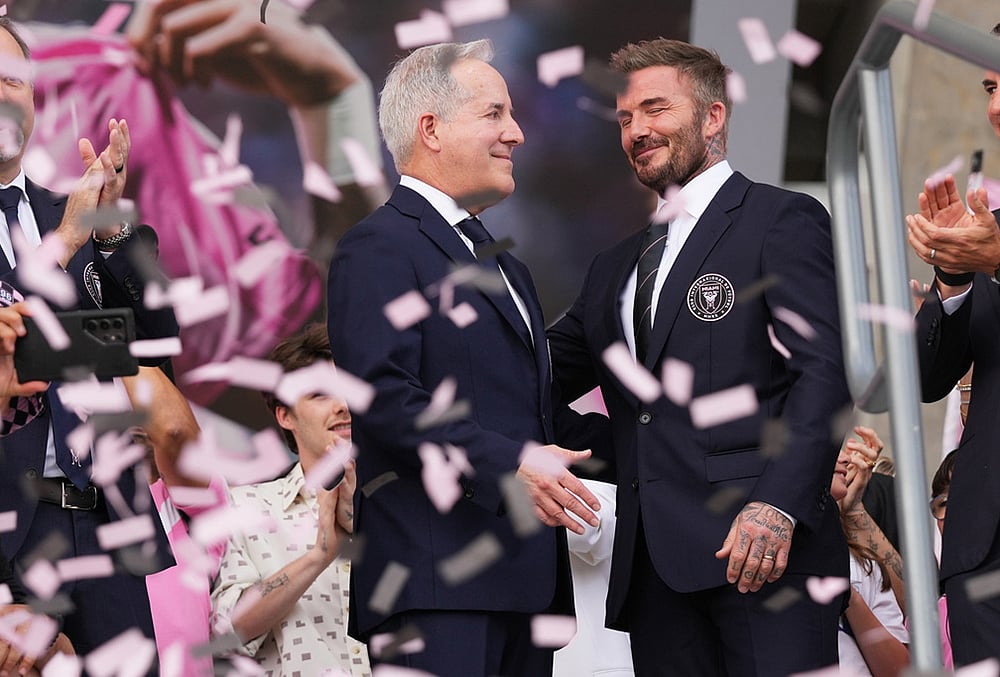 | Photo: AP/Lynne Sladky : Inter Miami CF managing owner Jorge Mas, left, and co-owner David Beckham, right, stand together during a ribbon cutting ceremony before Inter Miamis first MLS soccer match in Nu Stadium against Austin FC, in Miami. 