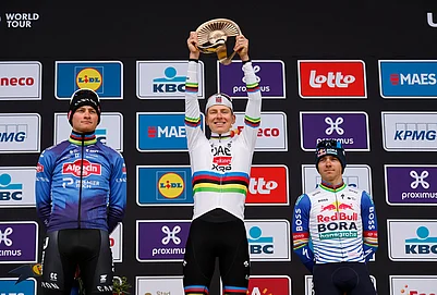 | Photo: AP/Geert Vanden Wijngaert : Slovenias Tadej Pogacar celebrates after winning the Tour of Flanders cycling race, with Netherlands Mathieu Van Der Poel, left, finishing second and Belgiums Remco Evenpoel third in Oudenaarde, Belgium.
