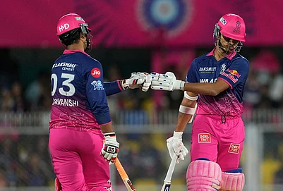 | Photo: AP/Anupam Nath : Rajasthan Royals Yashasvi Jaiswal, right, and Vaibhav Sooryavanshi encourage each other as they bat during the Indian Premier League cricket match between Mumbai Indians and Rajasthan Royals in Guwahati.