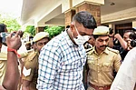 PTI : Police escort a convict outside a court premises in connection with the Sathankulam custodial death case, in Madurai, Monday, April 6, 2026. The court sentenced nine Tamil Nadu policemen to death for the 2020 custodial killing of J Benniks and his father P Jayaraj, terming it a rare case.