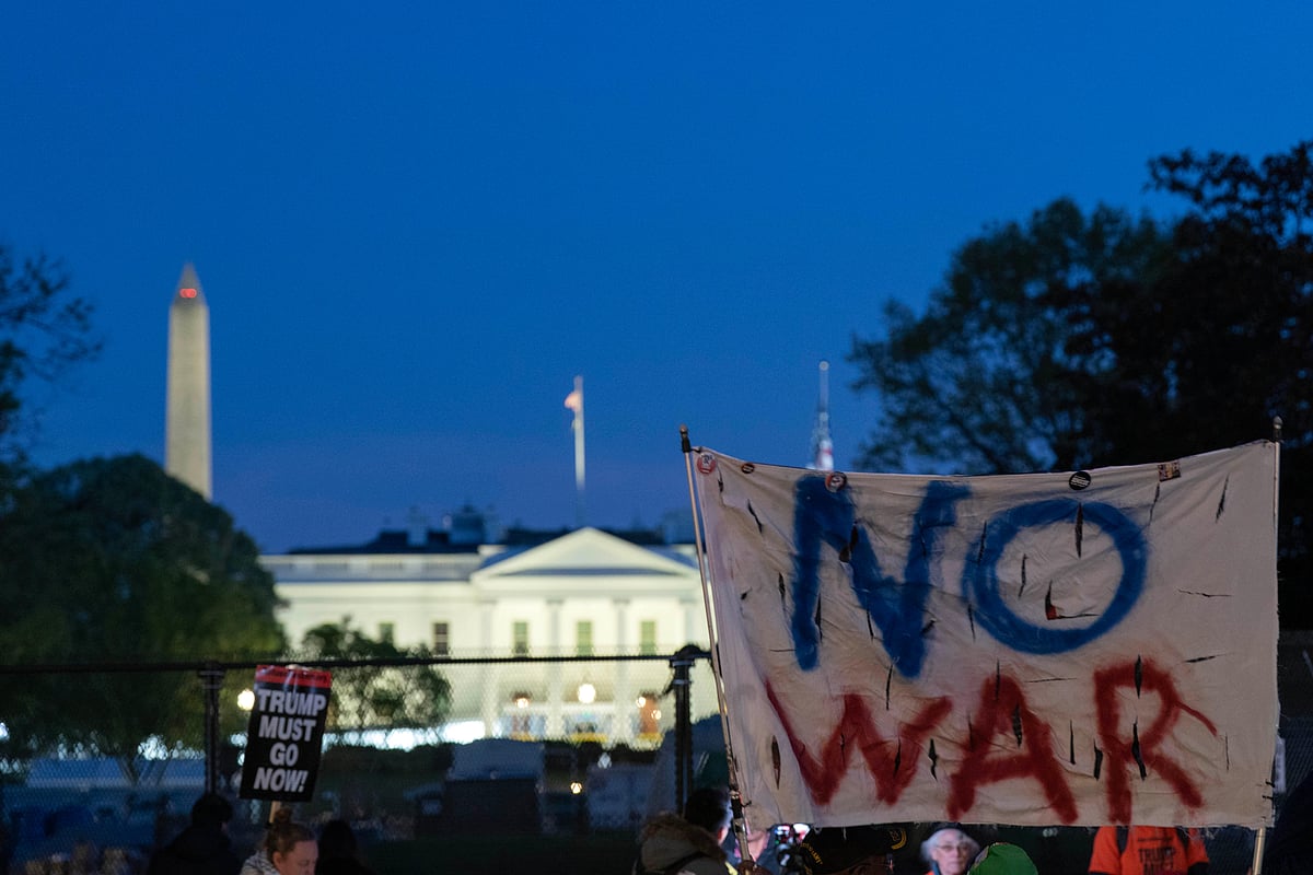 AP Photo/Jose Luis Magana : Activists protest at Lafayette Park near the White House in Washington, Tuesday evening, April 7, 2026. 