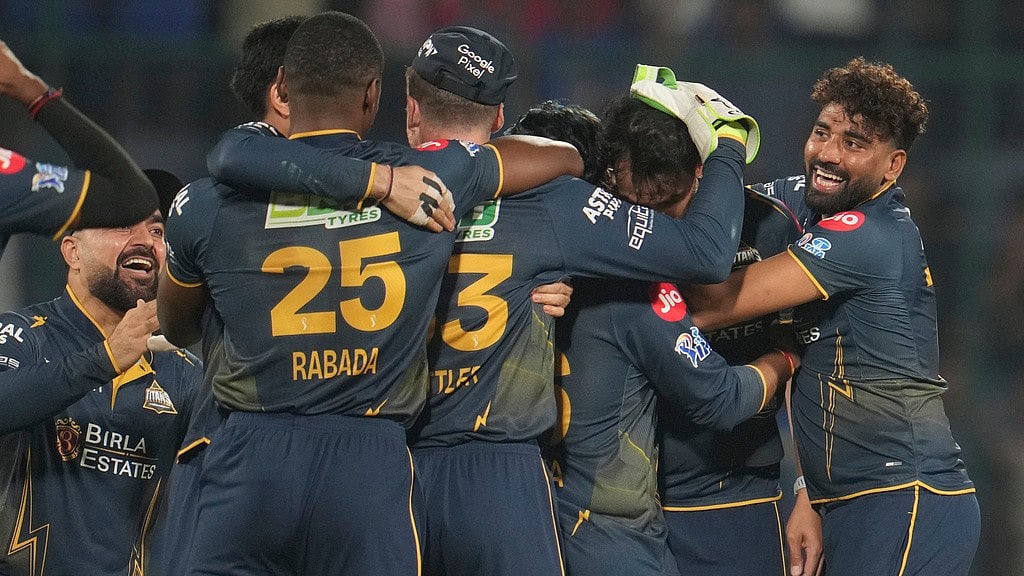 AP/Manish Swarup : Gujarat Titans players celebrate after they won the Indian Premier League match against Delhi Capitals in New Delhi.