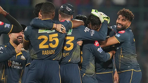 AP/Manish Swarup : Gujarat Titans players celebrate after they won the Indian Premier League match against Delhi Capitals in New Delhi.