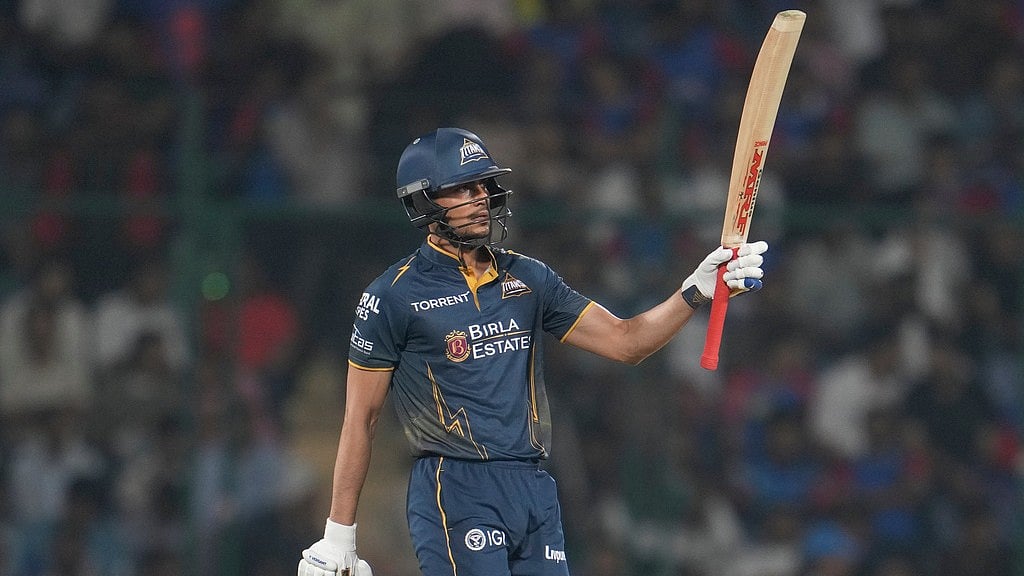 AP/Manish Swarup : Gujarat Titans captain Shubman Gill celebrates his fifty runs during the Indian Premier League match between Delhi Capitals and Gujarat Titans in New Delhi.