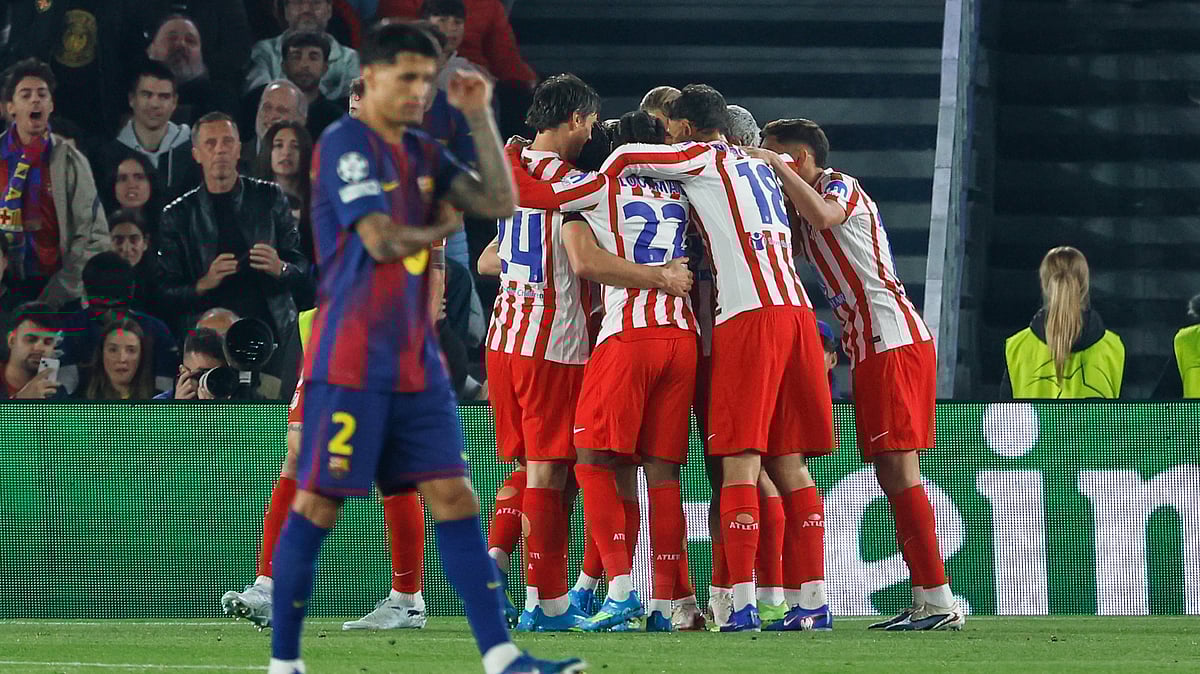 Joan Monfor/AP : Atletico Madrid players celebrate after Atletico Madrid's Julian Alvarez.