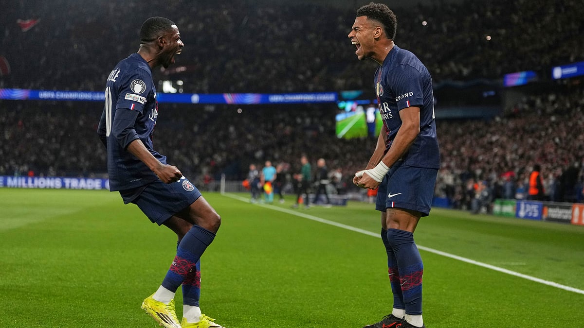 | Photo: AP/Thibault Camus : PSG's Desire Doue, right, celebrates with PSG's Ousmane Dembele after scoring the opening goal during the Champions League quarterfinal first leg soccer match between Paris Saint-Germain and Liverpool in Paris, Wednesday, April 8, 2026. 