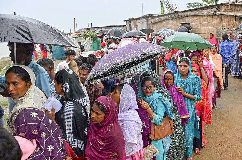 PTI : People wait in queues to cast their votes during the Assam Assembly elections, at a polling station, in Darrang district, Assam, Thursday, April 9, 2026.