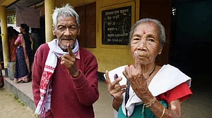 PTI : Guwahati: Elderly people show their ink-marked fingers after casting votes during the Assam Assembly elections, at a polling station, in Guwahati, Thursday, April 9, 2026.