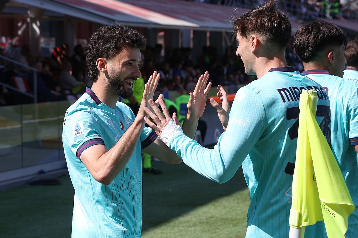 | Photo: Alberto Mariani/LaPresse via AP : Bologna's Joao Mario, left, celebrates scoring during the Serie A soccer match between Cremonese and Bologna in Cremona, Italy, Sunday April 5, 2026.