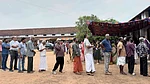 Photo: AP/ R S Iyer : People queue up to vote outside a polling booth during the Kerala state election in Kochi, India, Thursday, April 9, 2026.