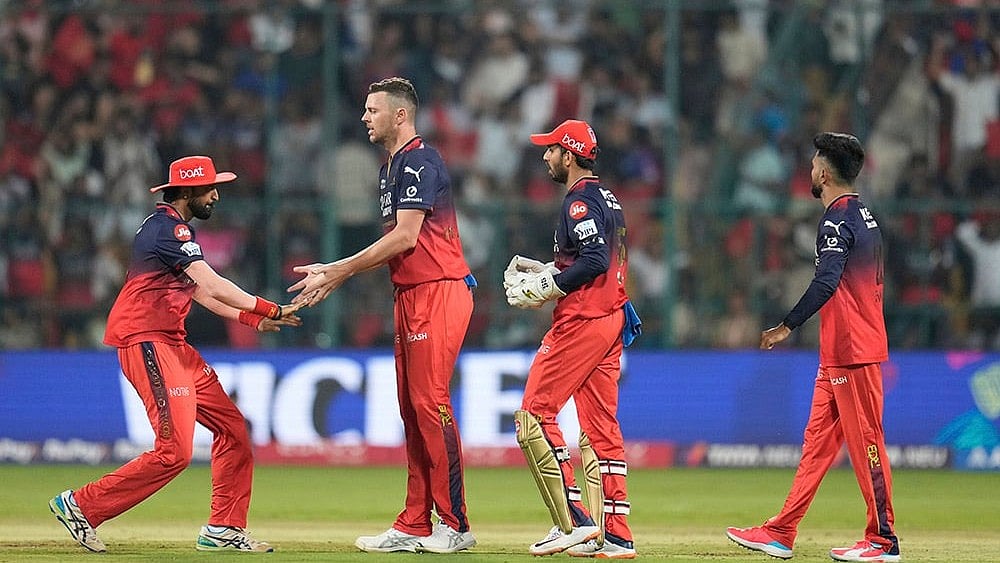 | Photo: AP/Aijaz Rahi : Josh Hazlewood returns into RCB playing XI against LSG after one-match break.