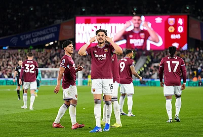 | Photo: Jordan Pettitt/PA via AP : West Ham Uniteds Konstantinos Mavropanos celebrates scoring their sides fourth goal of the game during their English Premier League soccer match against Wolverhampton Wanderers in London.