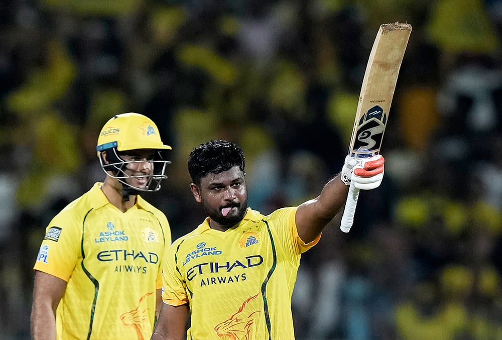 | Photo: AP/Mahesh Kumar A. : Chennai Super Kings Sanju Samson, right, celebrates his century during the Indian Premier League cricket match between Chennai Super Kings and Delhi Capitals in Chennai.