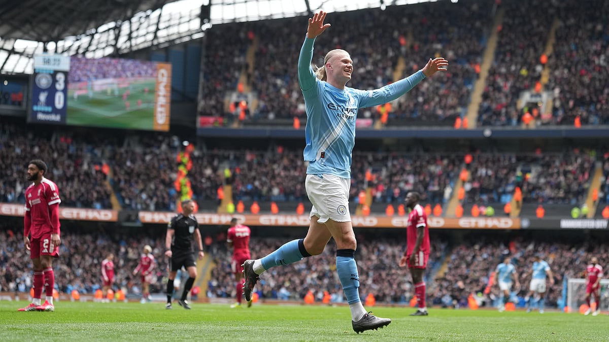 | Photo: AP/Jon Super : Manchester City's Erling Haaland celebrates after scoring his third goal during the FA Cup quarter-final soccer match between Manchester City and Liverpool in Manchester, England, Saturday, April 4, 2026. 