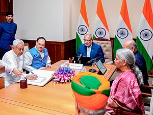 Source: PTI : In this image posted on April 10, 2026, Vice President and Rajya Sabha Chairman CP Radhakrishnan administers oath to Bihar Chief Minister Nitish Kumar as a member of the House during a ceremony at the formers chamber at the Parliament House complex, in New Delhi. Union Ministers JP Nadda and Nirmala Sitharaman are also seen.