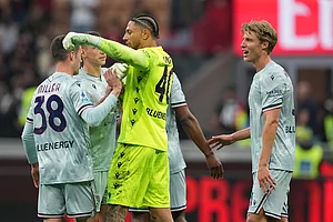 | Photo: AP/Antonio Calanni : Udinese players celebrate after the Serie A soccer match between AC Milan and Udinese, in Milan, Italy.