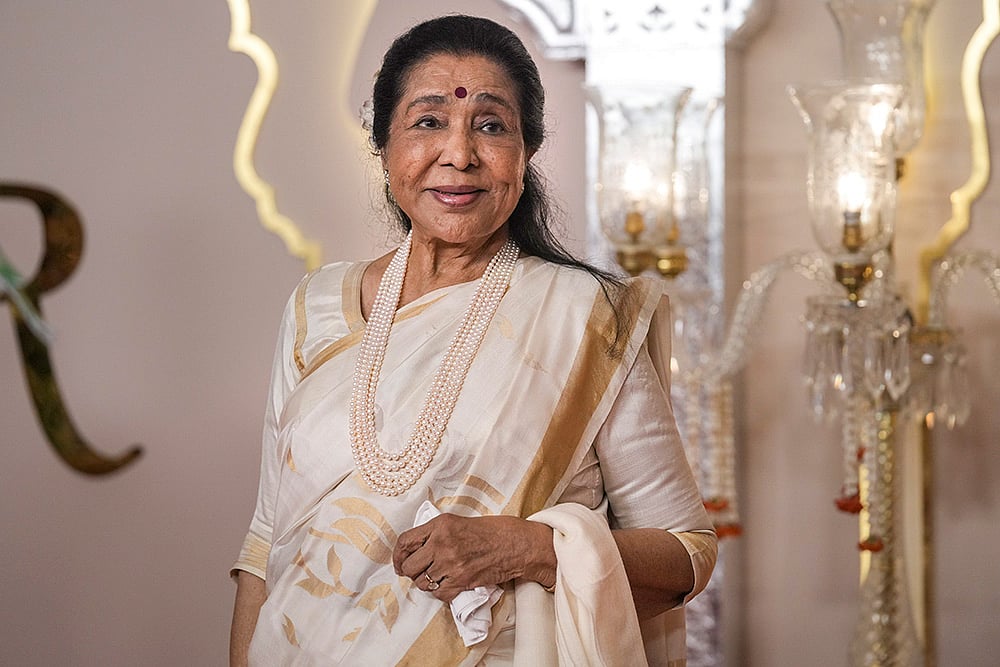 | Photo: PTI/Kunal Patil : Singer Asha Bhosle is seen here during an event at Jio World Convention Centre in Mumbai, in this file photo dated Friday, July 12, 2024. She passes away at 92 in Mumbai.